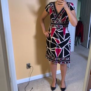 Dress size S. Very flattering.